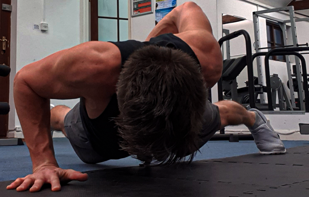 one arm pushup
